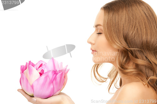 Image of beautiful woman with lotus flower 