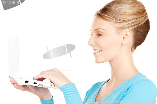 Image of happy woman with laptop computer