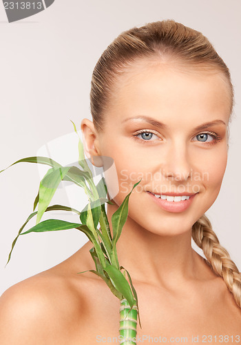 Image of woman with sprout