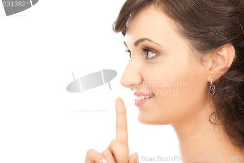 Image of finger on lips 
