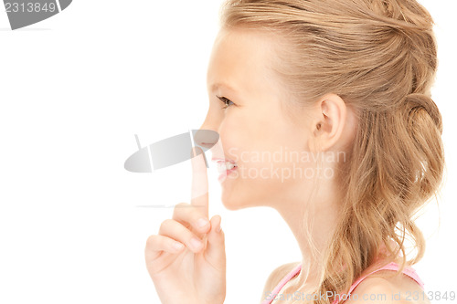 Image of finger on lips 