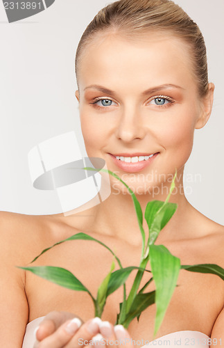 Image of woman with sprout