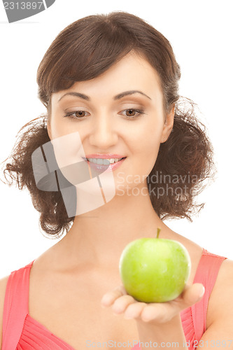 Image of young beautiful woman with green apple