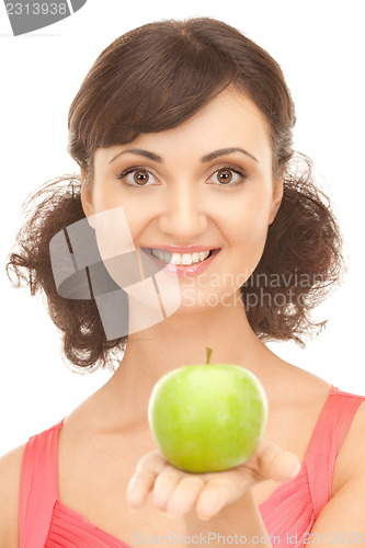 Image of young beautiful woman with green apple
