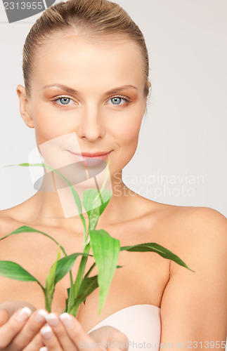 Image of woman with sprout