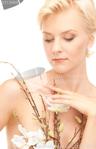 Image of lovely woman with twig