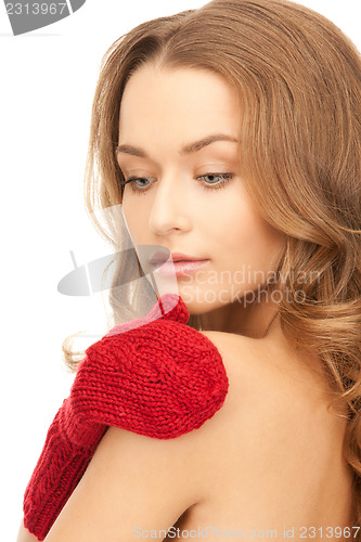 Image of beautiful woman in red mittens 