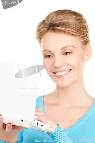 Image of happy woman with laptop computer
