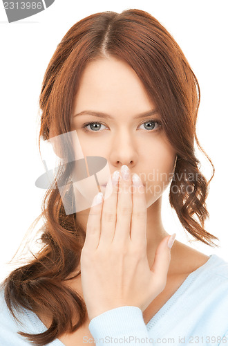 Image of hand over mouth