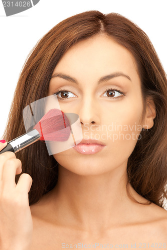 Image of lovely woman with brush