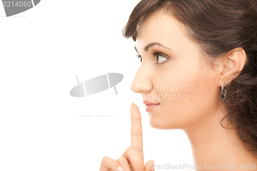 Image of finger on lips 