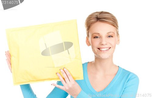 Image of businesswoman with parcel