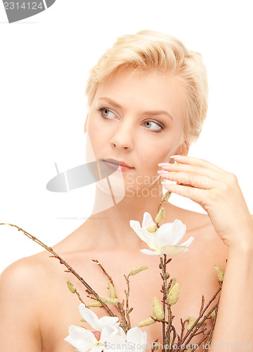 Image of lovely woman with twig