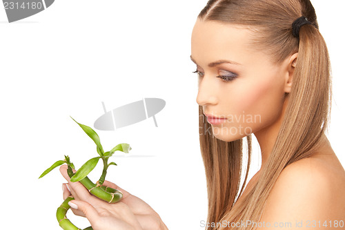 Image of woman with sprout