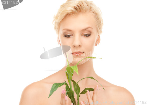 Image of woman with sprout