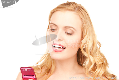 Image of happy woman with cell phone