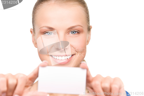Image of happy woman with business card