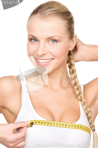 Image of beautiful woman with measure tape