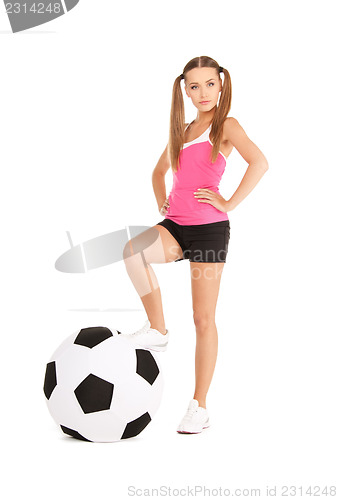 Image of lovely woman with big soccer ball