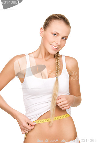 Image of beautiful woman with measure tape