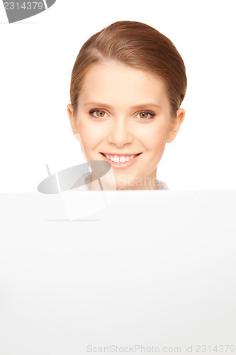 Image of happy teenage girl with blank board