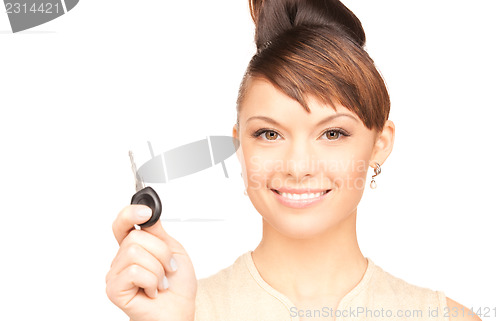 Image of happy woman with car key