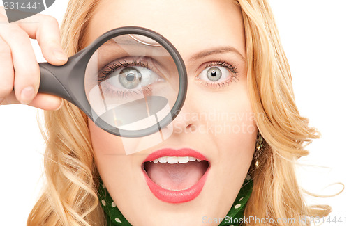 Image of woman with magnifying glass