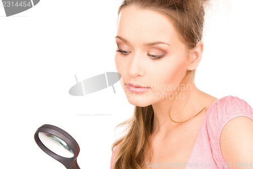 Image of woman with magnifying glass