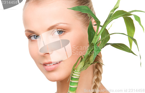 Image of woman with sprout
