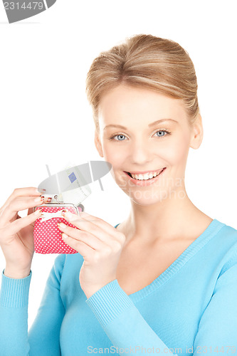 Image of lovely woman with purse and money