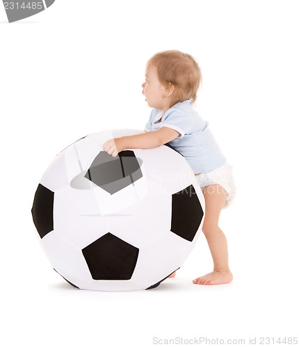 Image of baby boy with soccer ball