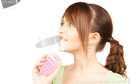 Image of lovely teenage girl with calculator