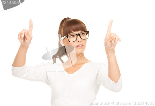 Image of businesswoman working with something imaginary