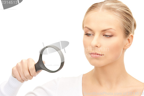 Image of woman with magnifying glass