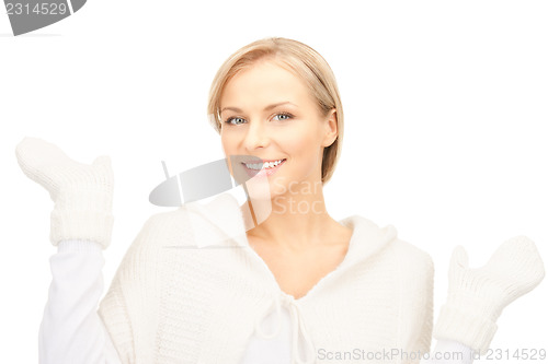 Image of beautiful woman in white sweater 