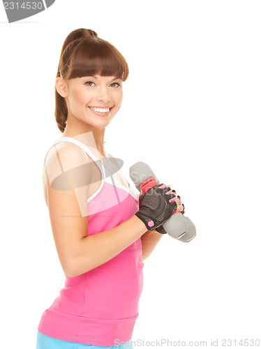 Image of fitness instructor with dumbbells