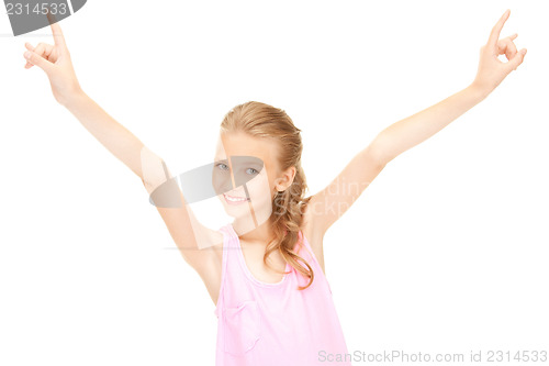 Image of happy girl showing devil horns gesture