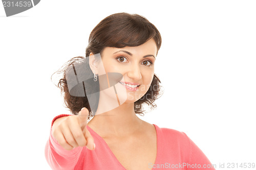 Image of attractive businesswoman pointing her finger