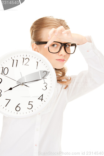 Image of girl holding big clock