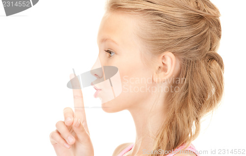 Image of finger on lips