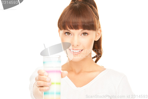 Image of lovely woman with glass of milk