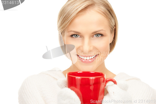 Image of beautiful woman with red mug