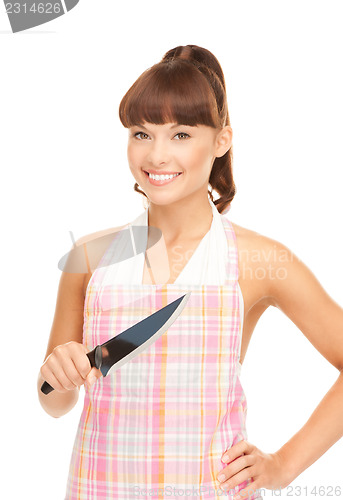 Image of housewife with big knife 