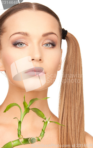 Image of woman with sprout
