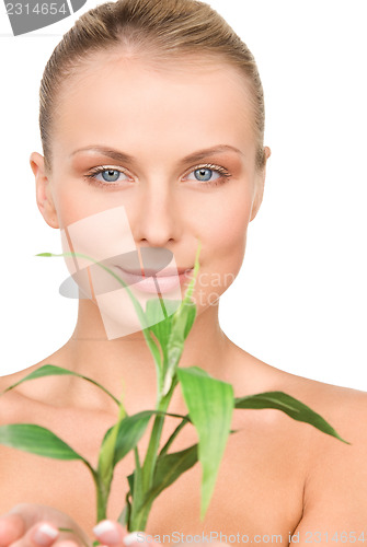 Image of woman with sprout