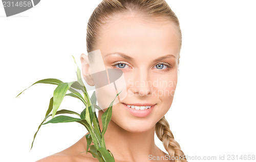Image of woman with sprout