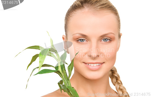 Image of woman with sprout