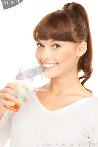 Image of lovely woman with glass of milk