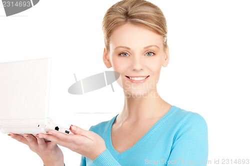Image of happy woman with laptop computer