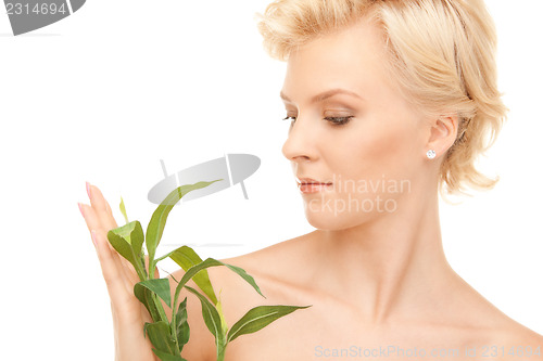 Image of woman with sprout